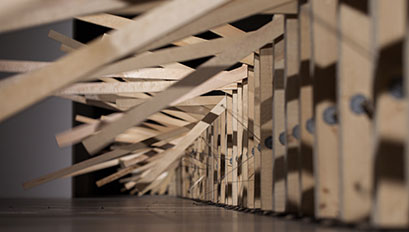 300 prepared dc-motors, 27 kg wood, by Zimoun